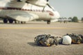 Parachute with equipment for paratroop on ground and military tr Royalty Free Stock Photo