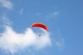 The parachute flies in the blue sky Royalty Free Stock Photo