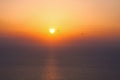 Parachute jump. Silhouette of parachutists over the ocean. Coloured sunset in Dubai, United Arab Emirates Royalty Free Stock Photo