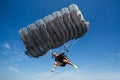 Parachute in the sky. Skydiver is flying a parachute in the blue sky.