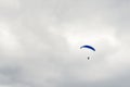 Parachute skydiver flying in clouds, travel adventure concept, s