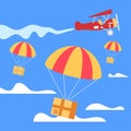 Parachutes with Boxes Falling Down from Airplane