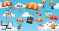 Parachutes in red and yellow lower various items through a cartoon-like sky filled with Royalty Free Stock Photo