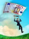 Parachuting businessman