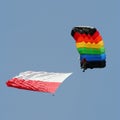 Parachutist with a colourful parachute Royalty Free Stock Photo