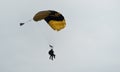 Parachutist in the sky on a cloudy day Royalty Free Stock Photo