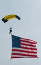 Parachutist in the sky on a cloudy day Royalty Free Stock Photo