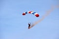 Parachutist / sky diver coming down to earth Royalty Free Stock Photo