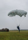 Parachutist on the white background