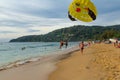 Parachutists fly over the sea Royalty Free Stock Photo