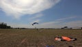 Parachutists touching the ground. Video 59.94 fps.