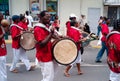 Parade for July 14 in Marigot, Saint Martin with Drummer Playing Bass Drum Royalty Free Stock Photo