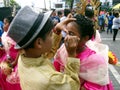 Parade participants apply make up to each other during the Sumaka Festival in Antipolo City.