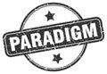 paradigm stamp. paradigm round grunge sign.