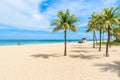 Paradise beach at Fort Lauderdale in Florida on a beautiful sumer day. Tropical beach with palms at white beach. USA. Royalty Free Stock Photo