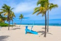 Paradise beach at Fort Lauderdale in Florida on a beautiful sumer day. Tropical beach with palms at white beach. USA Royalty Free Stock Photo