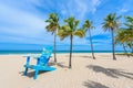 Paradise beach at Fort Lauderdale in Florida on a beautiful sumer day. Tropical beach with palms at white beach. USA Royalty Free Stock Photo