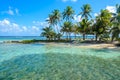 Paradise beach on island caye Carrie Bow Cay Field Station, Caribbean Sea, Belize. Tropical destination Royalty Free Stock Photo