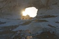 Paradise gate, a natural arch in white chalk limestone rock in the Egyptian White Desert National Park