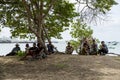 A Paradise island, tropical beach, emerald green sea with beach trees and blue sky background, Indonesia, south asia. Local people