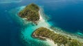 Paradise islands with white sand, palm trees and crystal blue water in Palawan, The Philippines Royalty Free Stock Photo