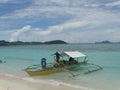 Trimaran at paradise tropical island beach, Coron, Philippines Royalty Free Stock Photo