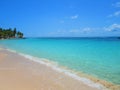 The paradise turquoise sea under a cloudless blue sky Royalty Free Stock Photo