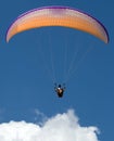 Paraglider above the cloud