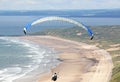 Paraglider above Rhossili beach Royalty Free Stock Photo