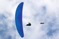 Paraglider being towed on a winch launch