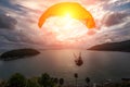 Paraglider chasing the sunset on Windmill Viewpoint. Phuket, Thailand