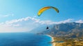 Paraglider flies over the sea against the background of mountains and blue sky. Generative AI. Royalty Free Stock Photo