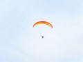 Paraglider in flight, near Loch Leven, Perth and Kinross, Scotland