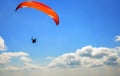 Paraglider floating in the air against the sky. Royalty Free Stock Photo