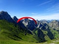 Paraglider flying with blue skies