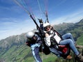 Paraglider flying with blue skies