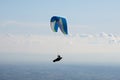 Paraglider flying in the blue sky. Italian Alps. Piedmont. Italy Royalty Free Stock Photo
