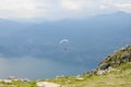 Paraglider is flying in front of mountain landscape of Alps - Mo Royalty Free Stock Photo