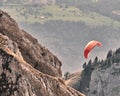 Paraglider flying near Mount Pilatus in Switzerland