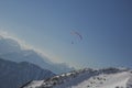 Paraglider flying over the Austrian Apls on the sunny day Royalty Free Stock Photo