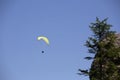Paraglider flying over Bavarian mountains Royalty Free Stock Photo