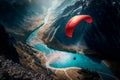 Paraglider flying over landscape from the background beauty nature mountain landscape with a clear blue lake of the sky Royalty Free Stock Photo