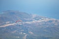 Paraglider flying over mount Tahtali, Turkey, Kemer. Paragliding in the mountains