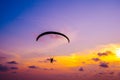 Paraglider flying on sky at sunset Royalty Free Stock Photo