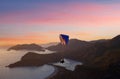 Paraglider flying at sunset over Blue lagoon in Oludeniz, Turkey