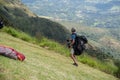 Getting ready to lift off on a paraglider Royalty Free Stock Photo