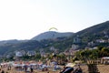 Paraglider landing in a special zone at Cleopatra Beach in Alanya Turkey Royalty Free Stock Photo