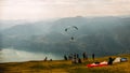 Paraglider on Mote Baldo andl ake Garda in Italy