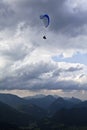 Paraglider over the mountains in Lofer Austria.