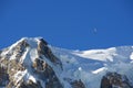 Paraglider over the summit of Mont Blanc massif, Italy